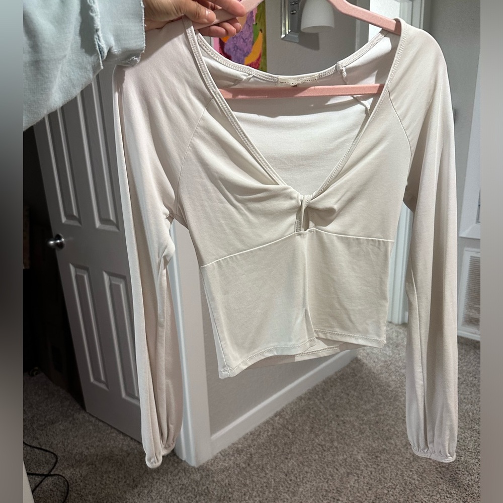 Truly Madly Deeply front tie long sleeve blouse. So flattering and buttery soft